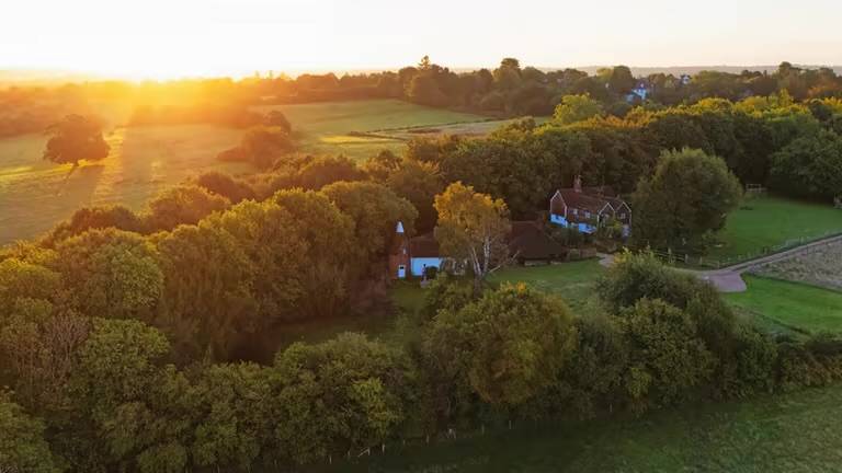 Drone pictire of Oast house in rural setting