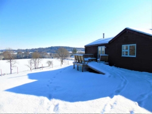 Cottage exterior with snow