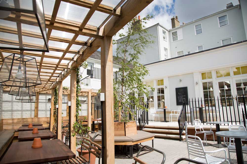 Royal-Wells-Hotel-Tunbridge-Wells—-exterior-(rr) Hotel garden with seating