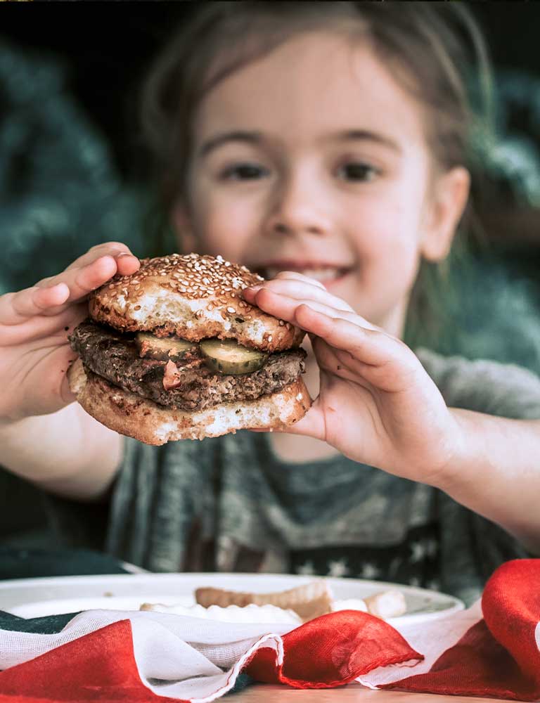 Child eating a burger