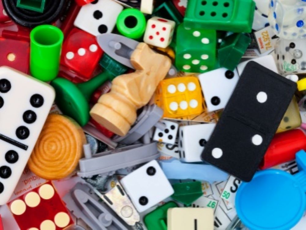 A bundle of dominos, dice and other games