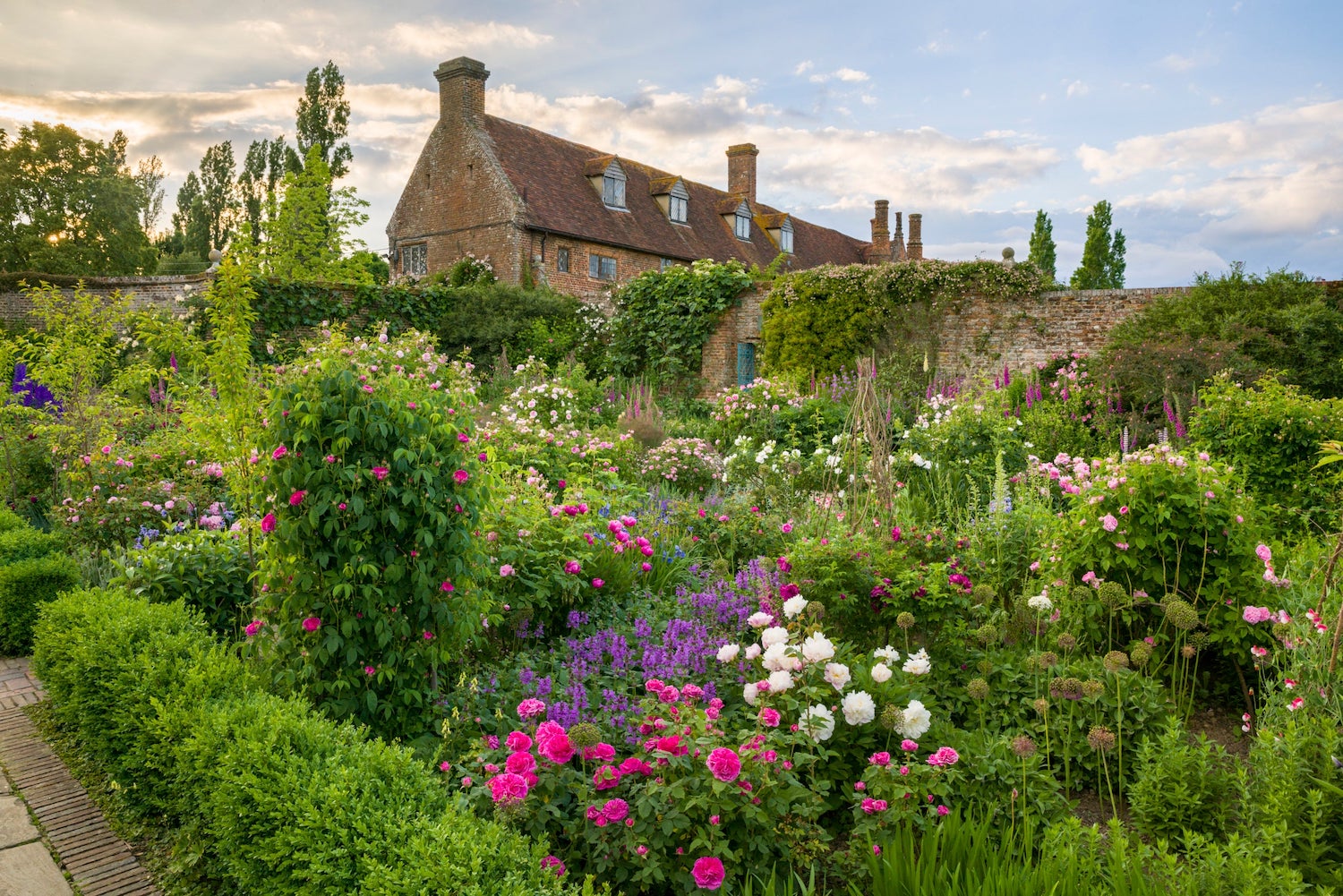 Sissinghurst Garden blooming with an abundance of pink, purple and white flowers