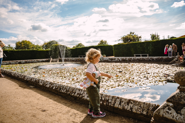 Child looking at the water in Penshurst