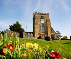 Church with daffodils in foreground