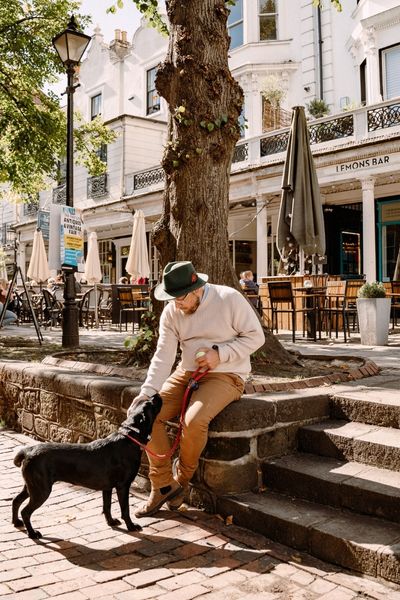 Man with his dog on The Pantiles