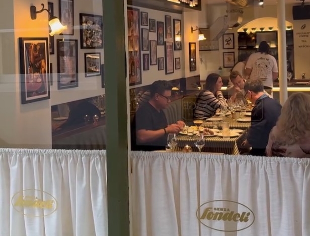 Senza Fondeli View through window of restaurant dining area