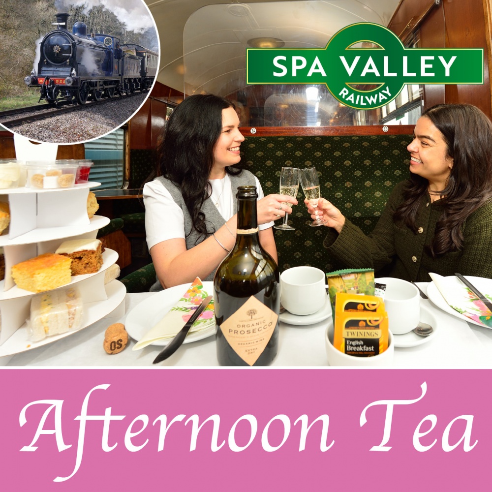 People enjoying afternoon tea on a train
