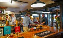 The Nevill Crest & Gun bar