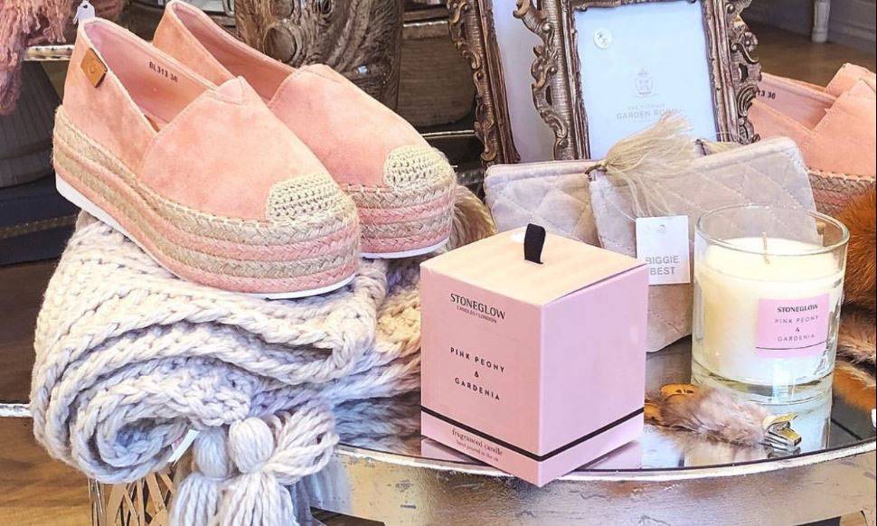 Maisie K Boutique shoes, blankets and candle